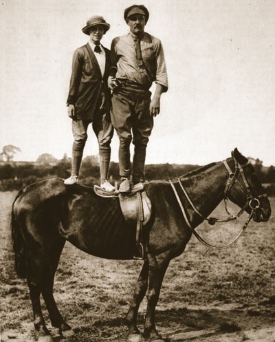 Training a recruit: Lieut. Mike Rimington, a lady-pupil and an equine subject by English Photographer